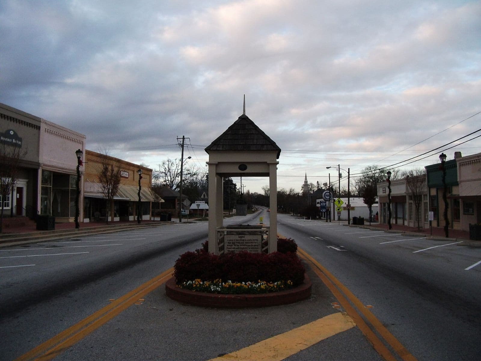 Downtown Social Circle street with central gazebo-style monument